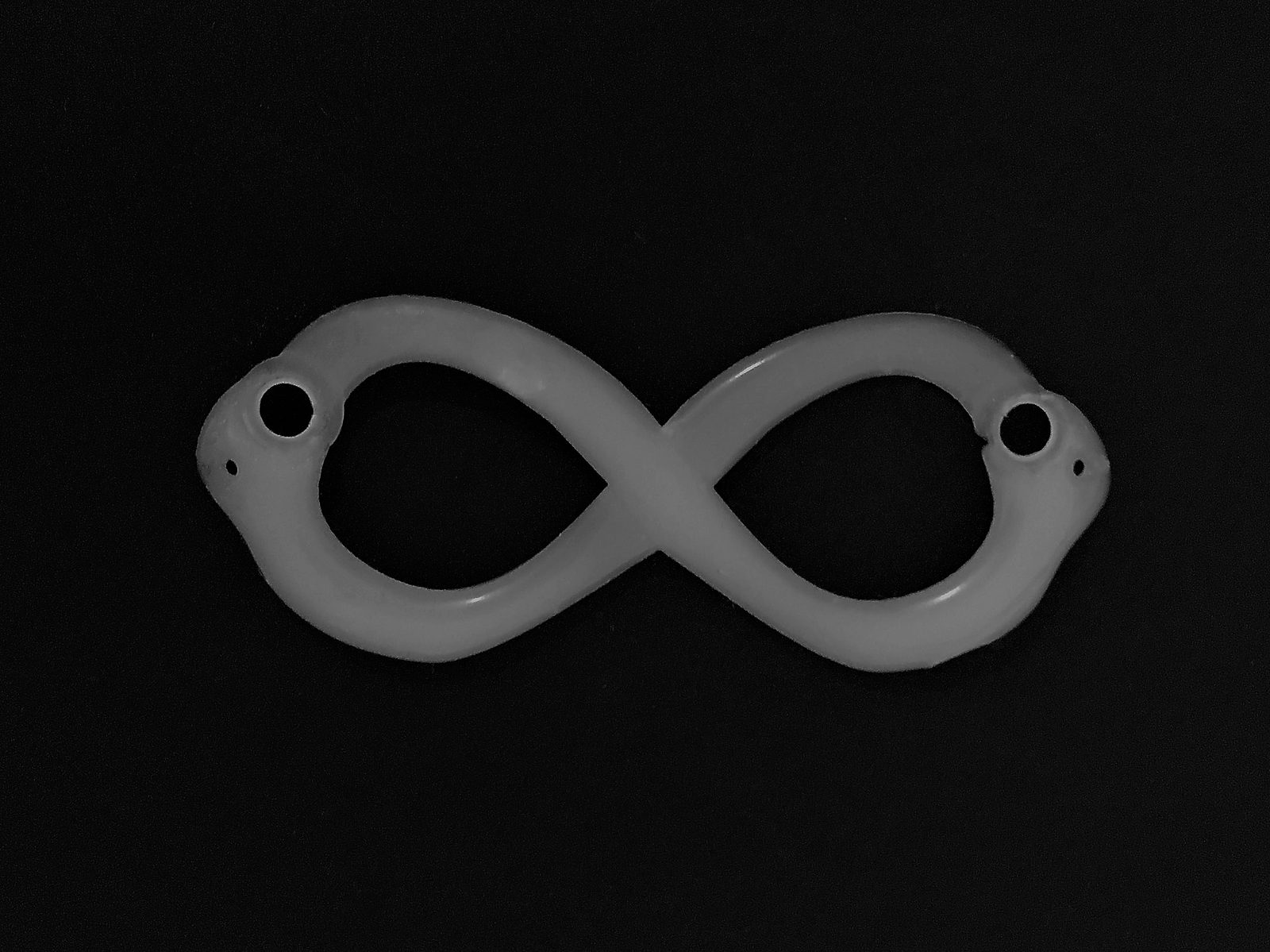 Ouroboros infinity snake on black background
